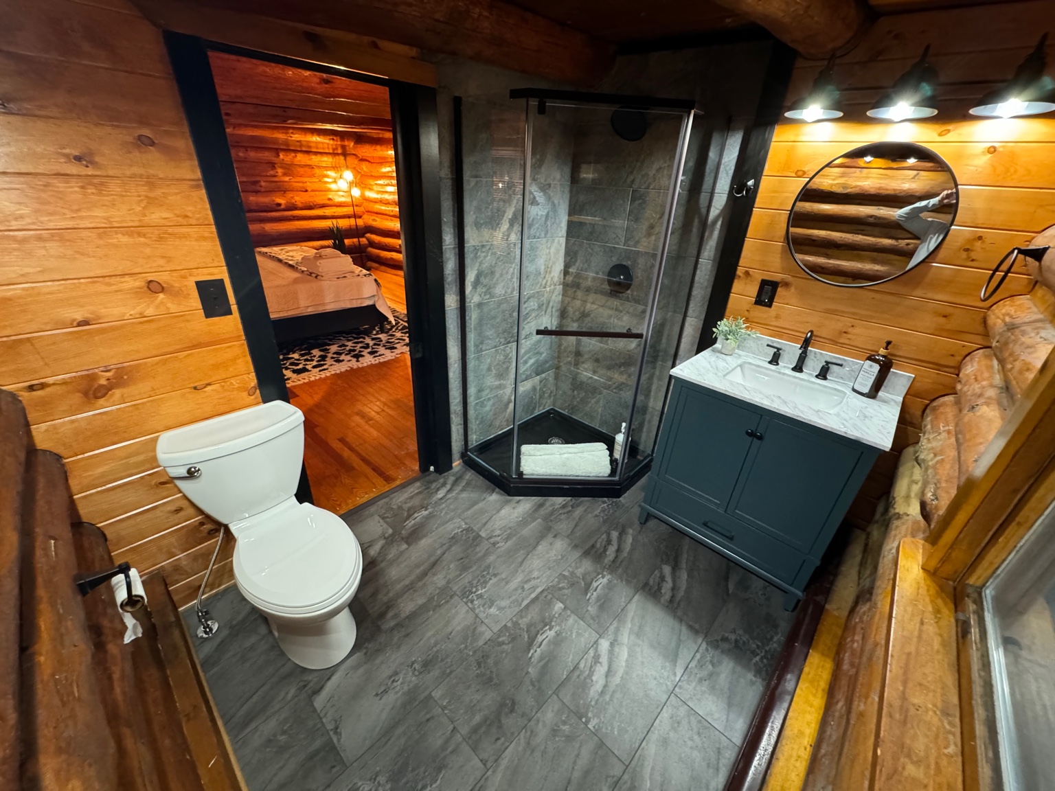 Bathroom with stone tile shower