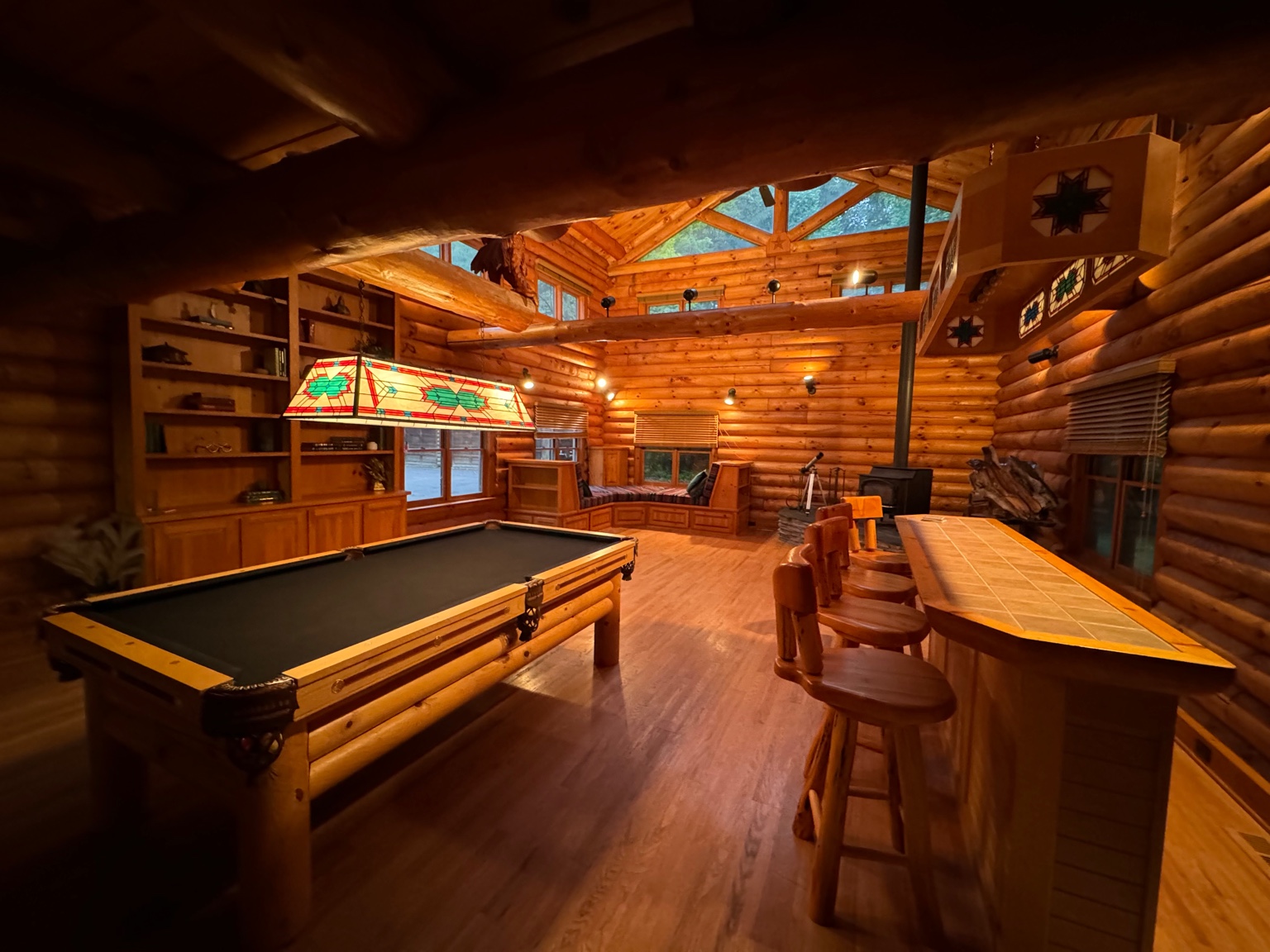 Great room with pool table and vaulted ceilings