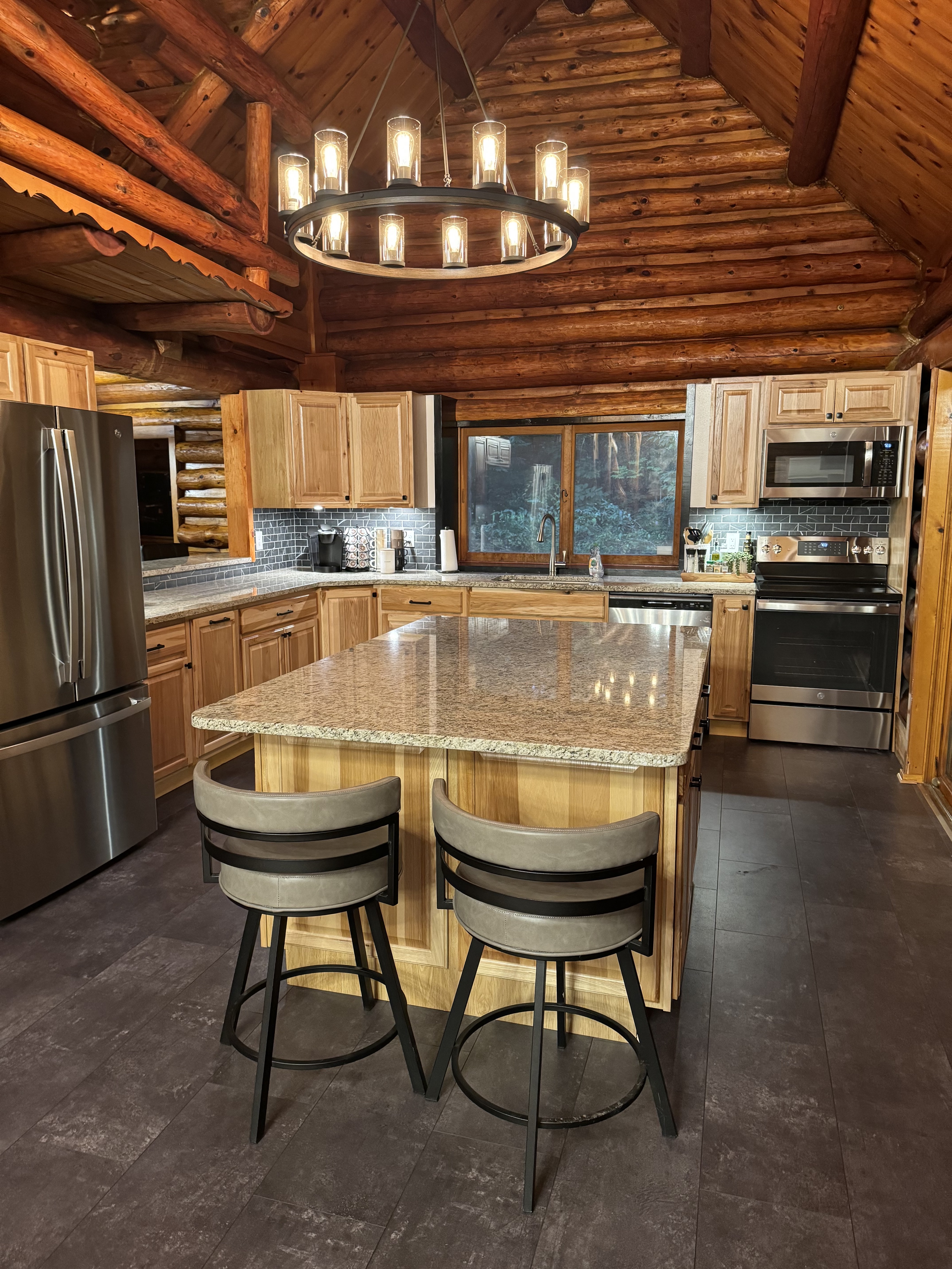 Modern kitchen with large island, stainless appliances