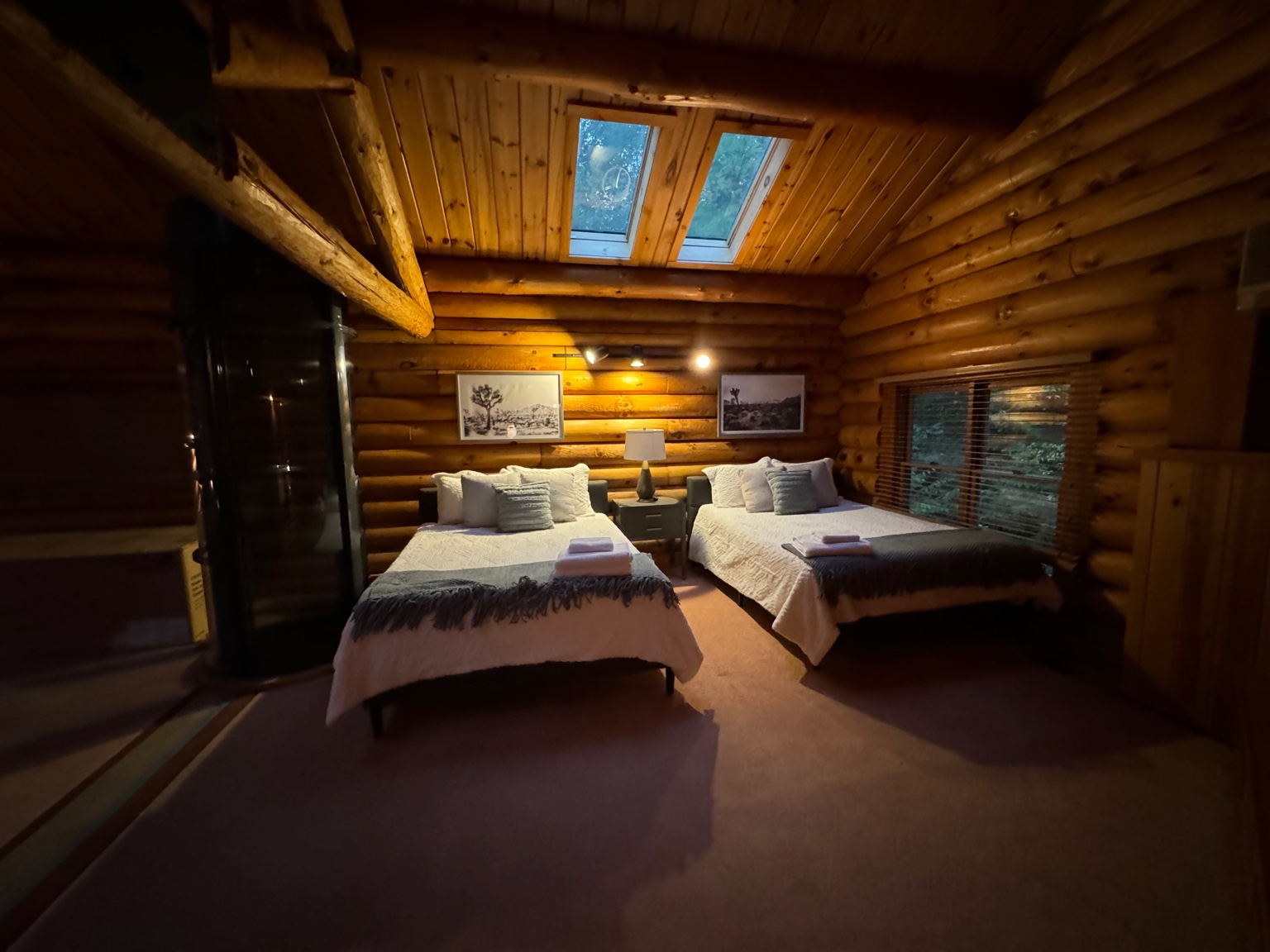 Loft with two full beds and skylights